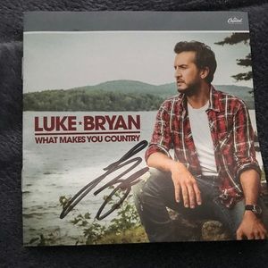 Autographed “what makes you country” album booklet